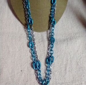 Claire's silvertone blue anodized aluminum necklace